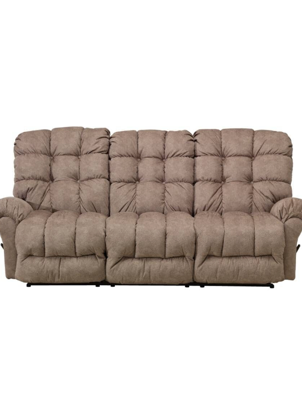 Best Home Furnishings Corey Reclining Sofa in neutral fabric, featuring plush pillow fiber-filled back and chaise lounge, with a manual reclining handle.